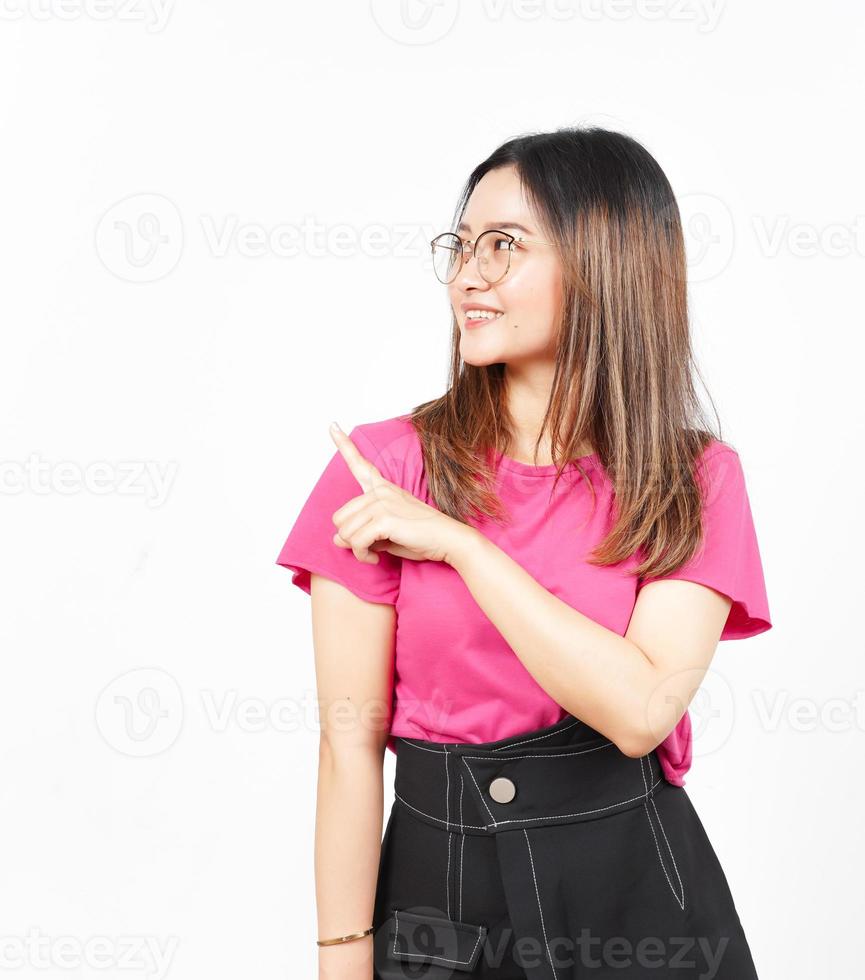 Showing Product and Pointing Side Of Beautiful Asian Woman Isolated On White Background photo