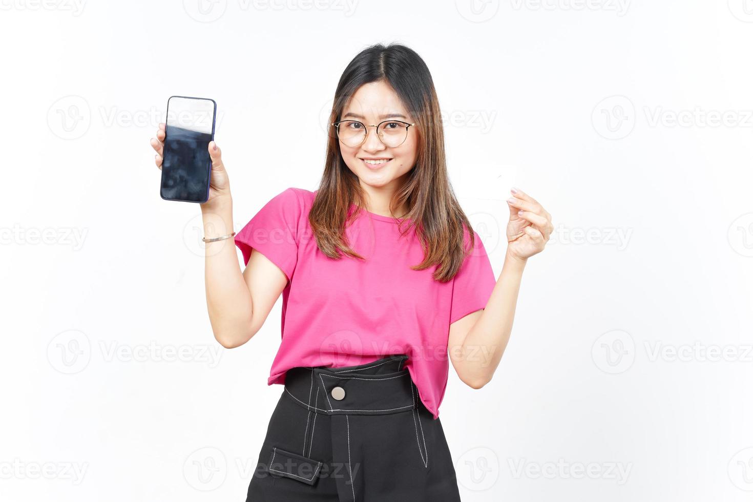 Holding Blank Bank Card and Blank Screen Smartphone Of Beautiful Asian Woman Isolated On White photo