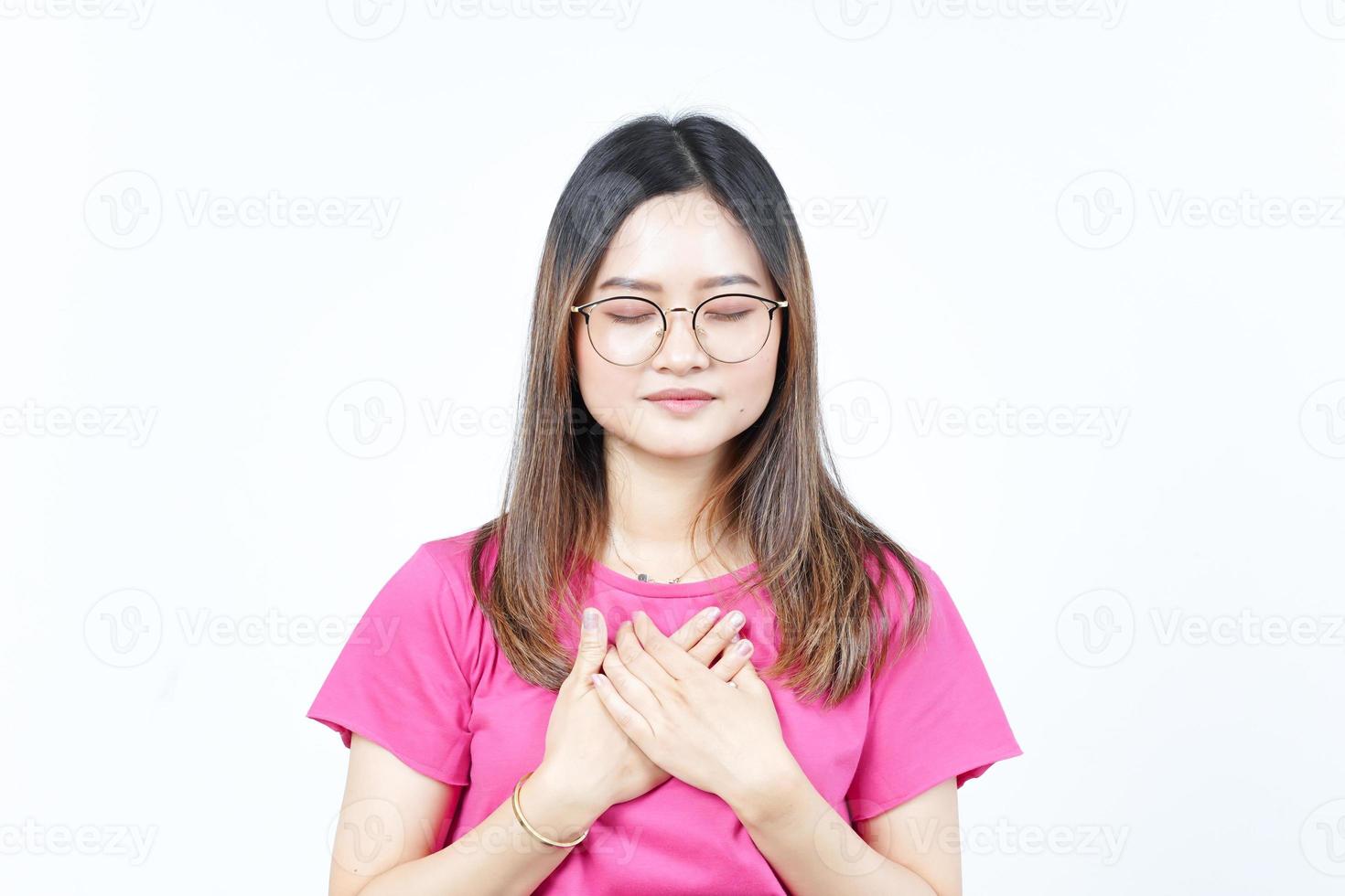 Grateful Gesture Of Beautiful Asian Woman Isolated On White Background photo