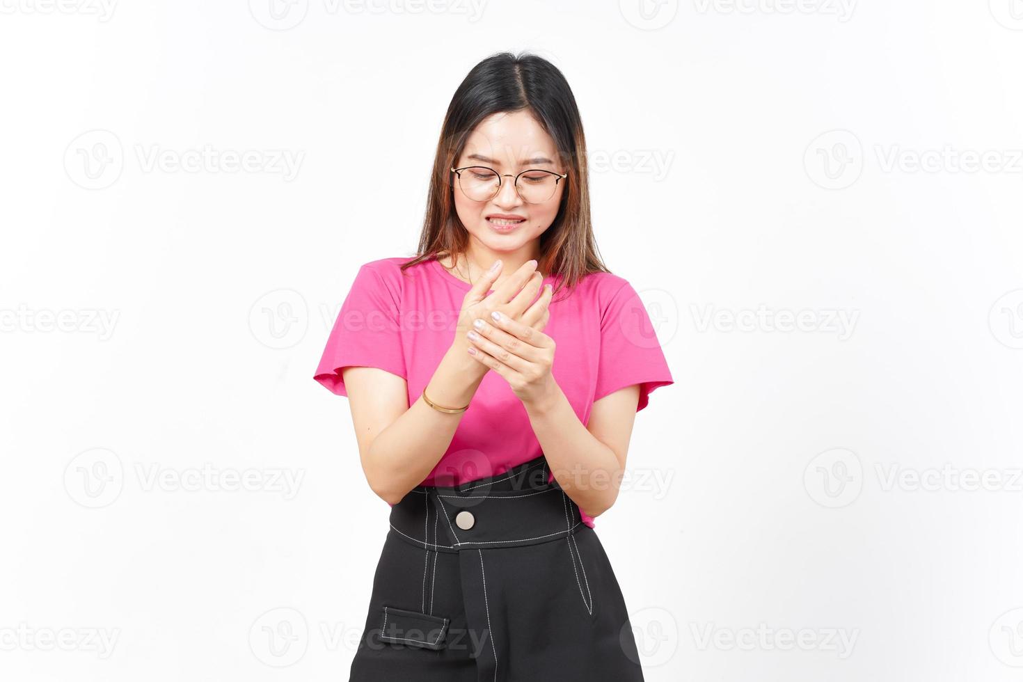 Suffering pain on hands Of Beautiful Asian Woman Isolated On White Background photo