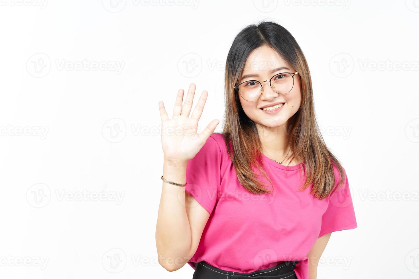 Hi Greeting or Waving at Camera Of Beautiful Asian Woman Isolated On White Background photo
