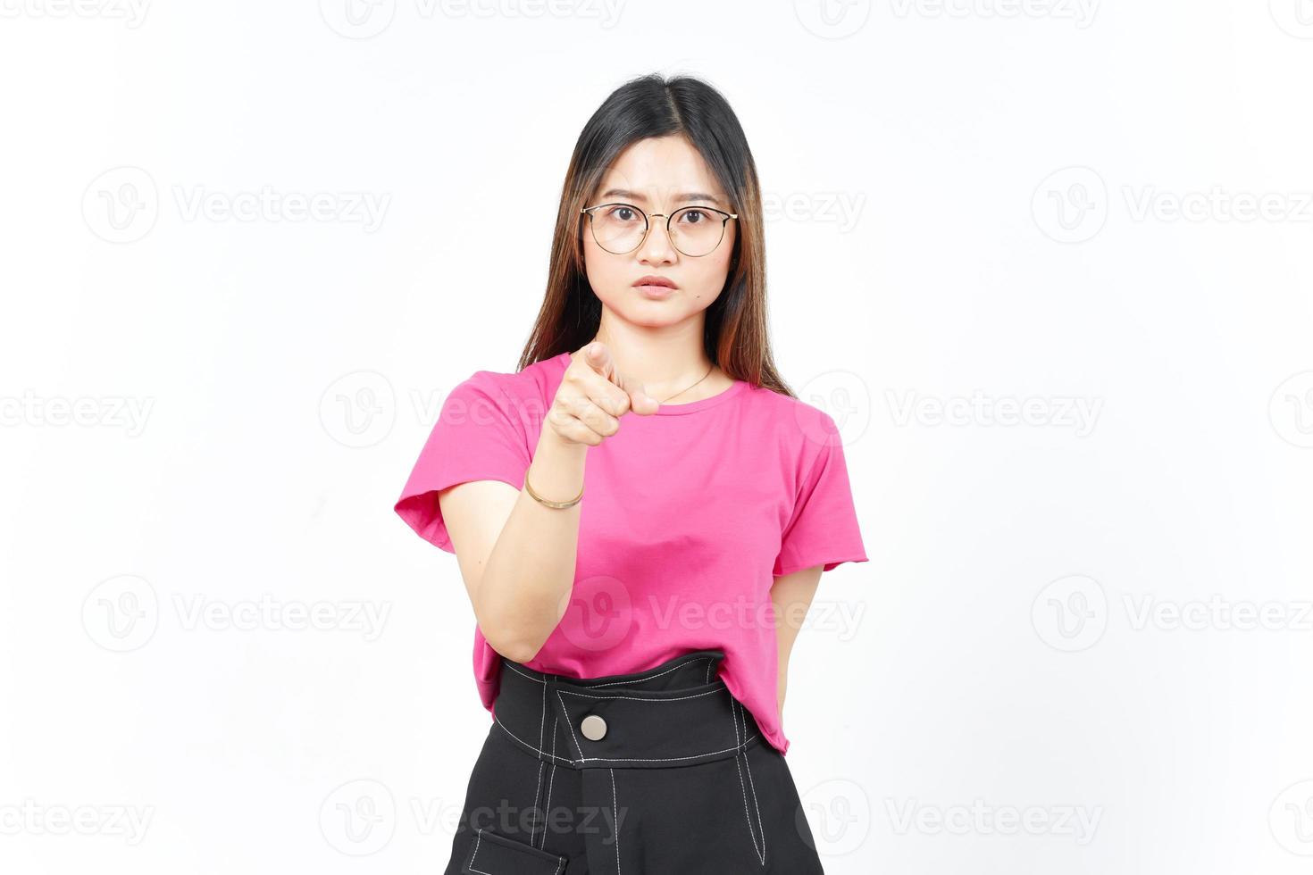 Angry face expression and pointing at camera Of Beautiful Asian Woman Isolated On White Background photo