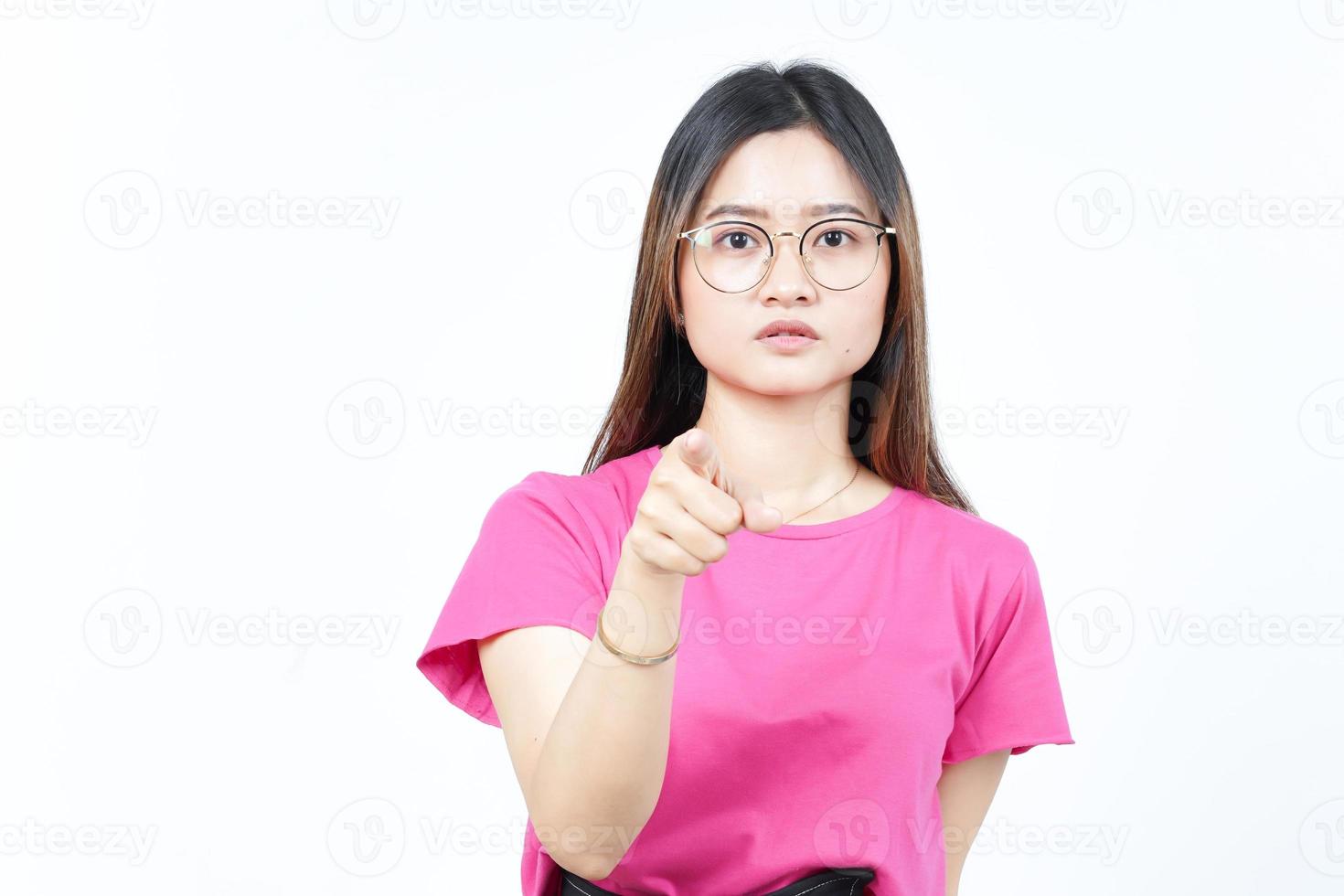 Angry face expression and pointing at camera Of Beautiful Asian Woman Isolated On White Background photo