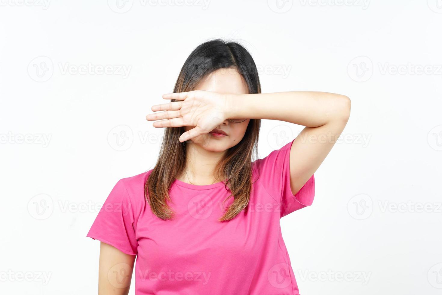 Covering Eyes With Arms Of Beautiful Asian Woman Isolated On White Background photo
