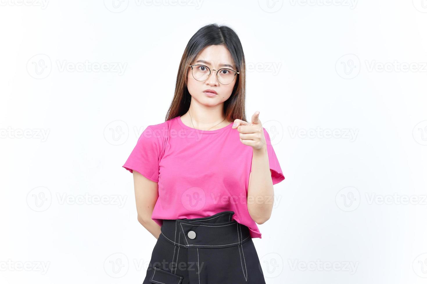 Angry face expression and pointing at camera Of Beautiful Asian Woman Isolated On White Background photo