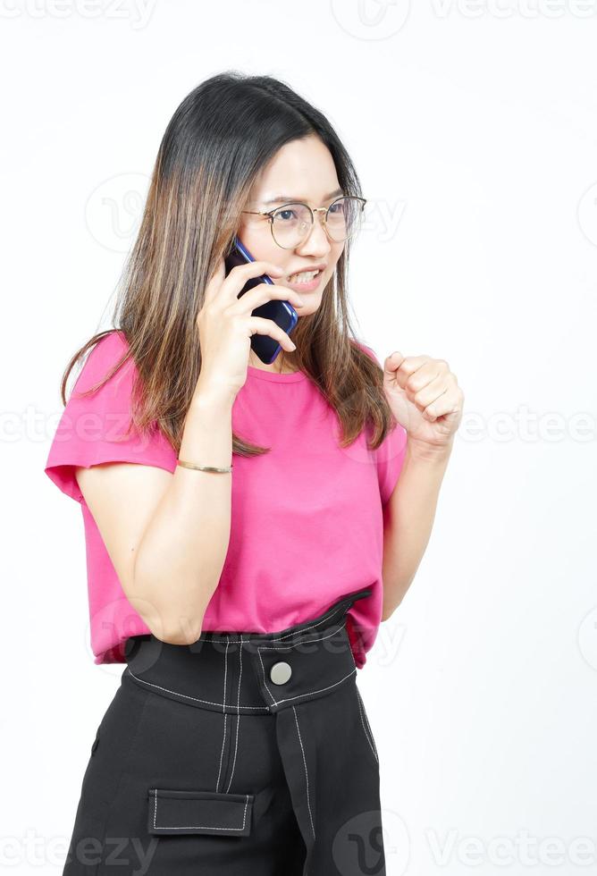 Talking on the smartphone with Angry face Of Beautiful Asian Woman Isolated On White Background photo