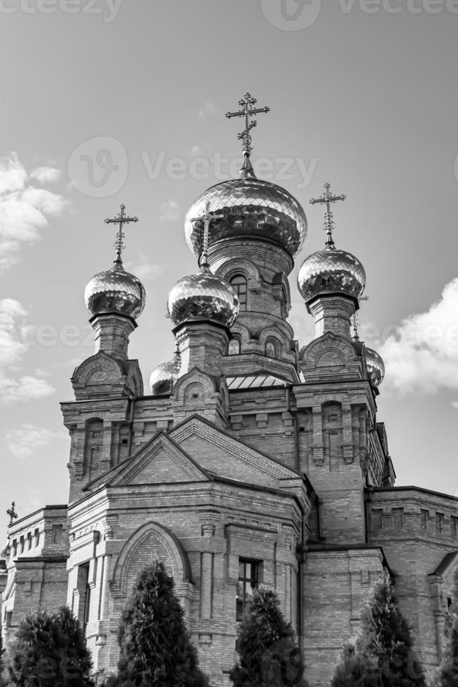 Christian church cross in high steeple tower for prayer photo