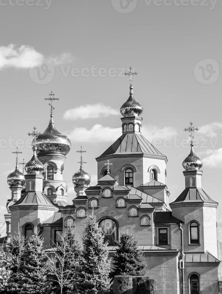 Christian church cross in high steeple tower for prayer photo