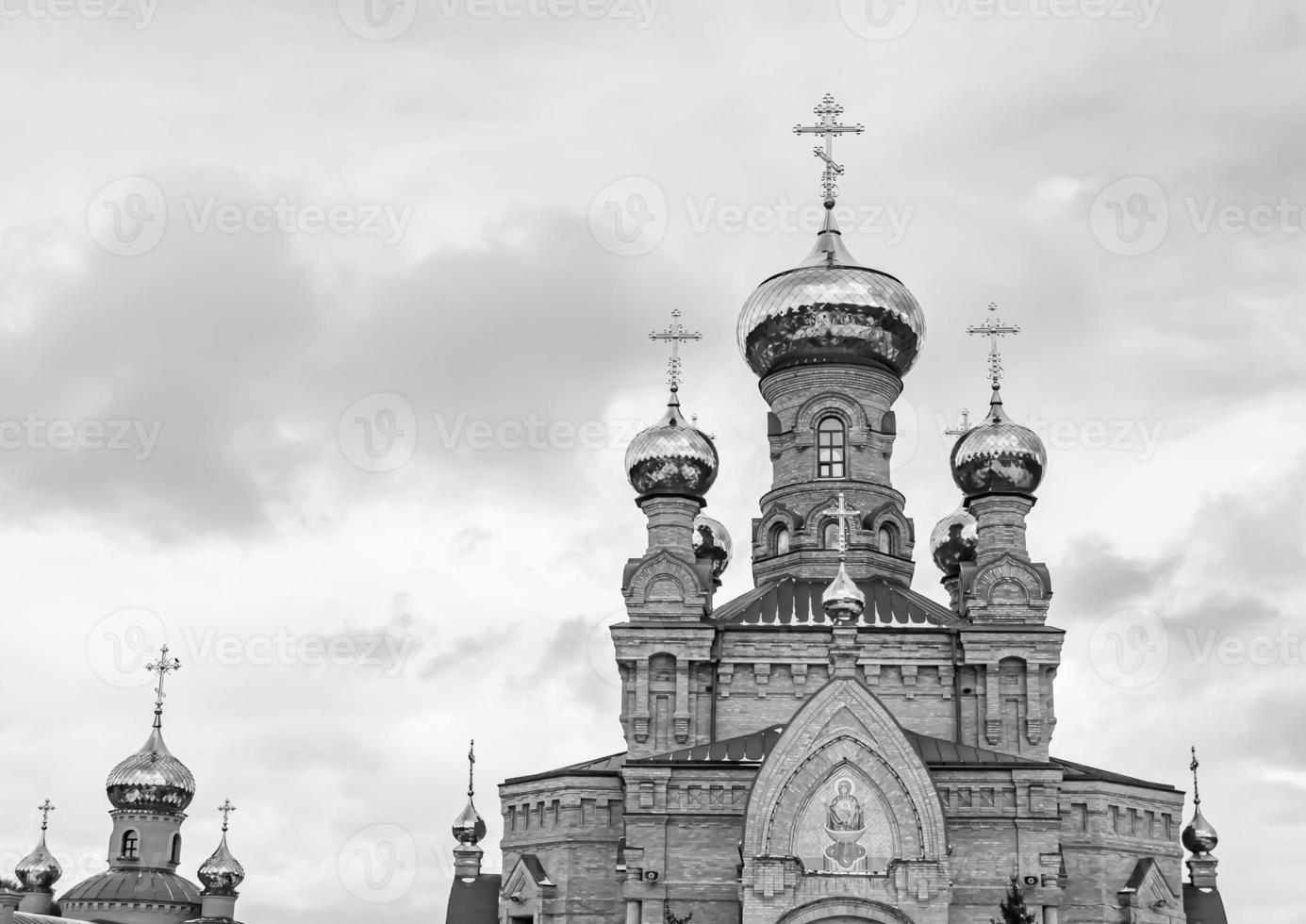 Christian church cross in high steeple tower for prayer photo