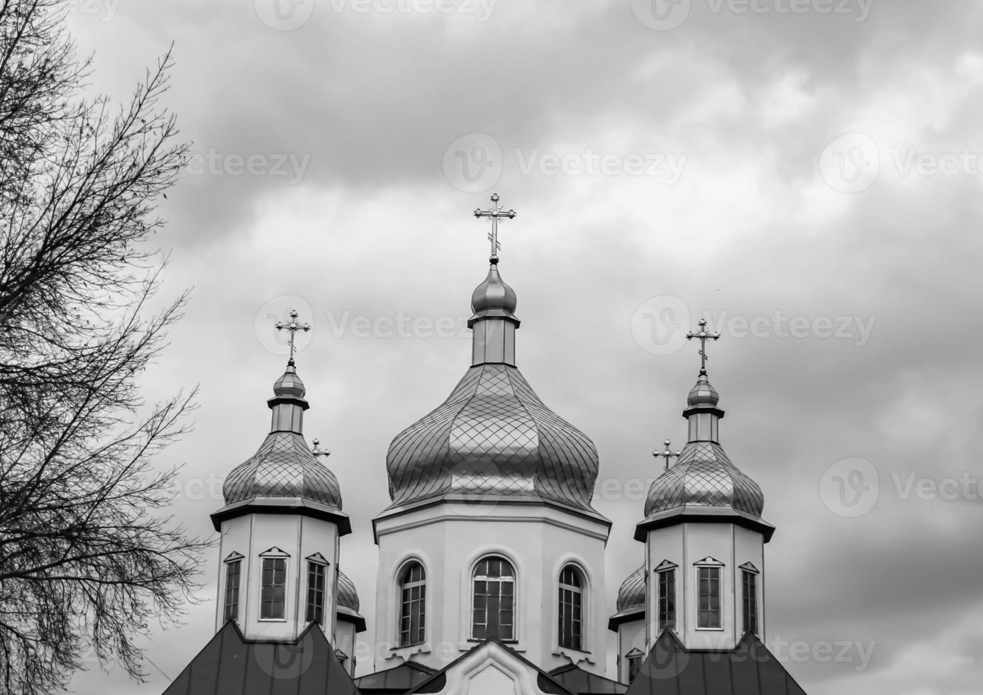 Christian church cross in high steeple tower for prayer photo