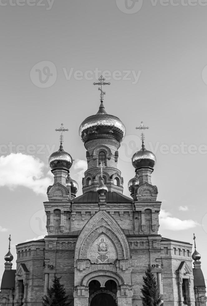 Christian church cross in high steeple tower for prayer photo