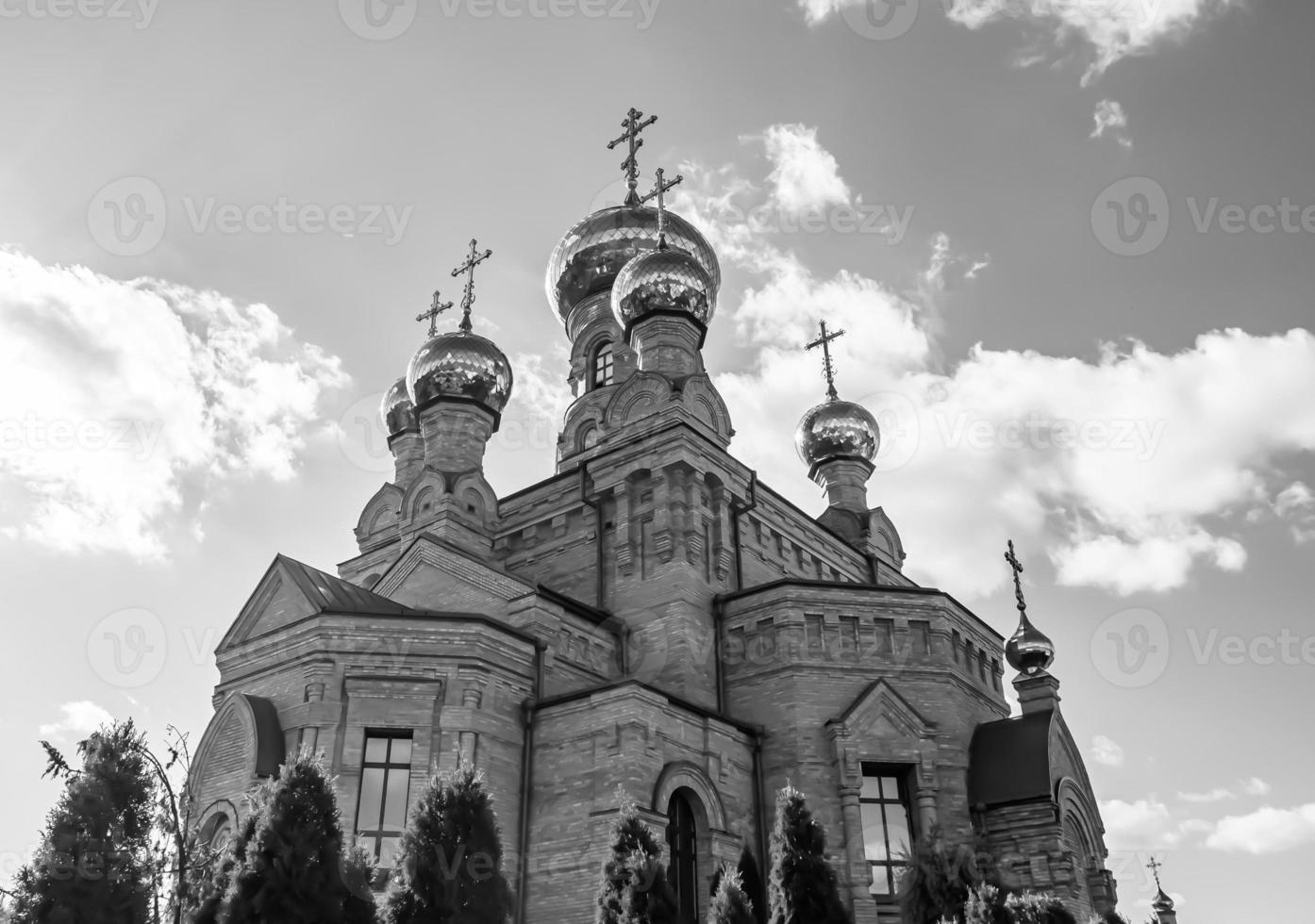 Christian church cross in high steeple tower for prayer photo