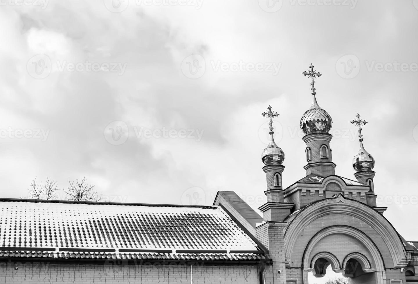 Christian church cross in high steeple tower for prayer photo