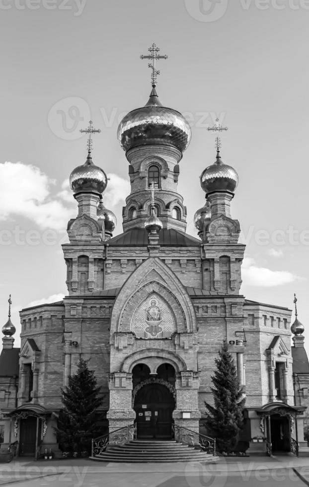 Christian church cross in high steeple tower for prayer photo