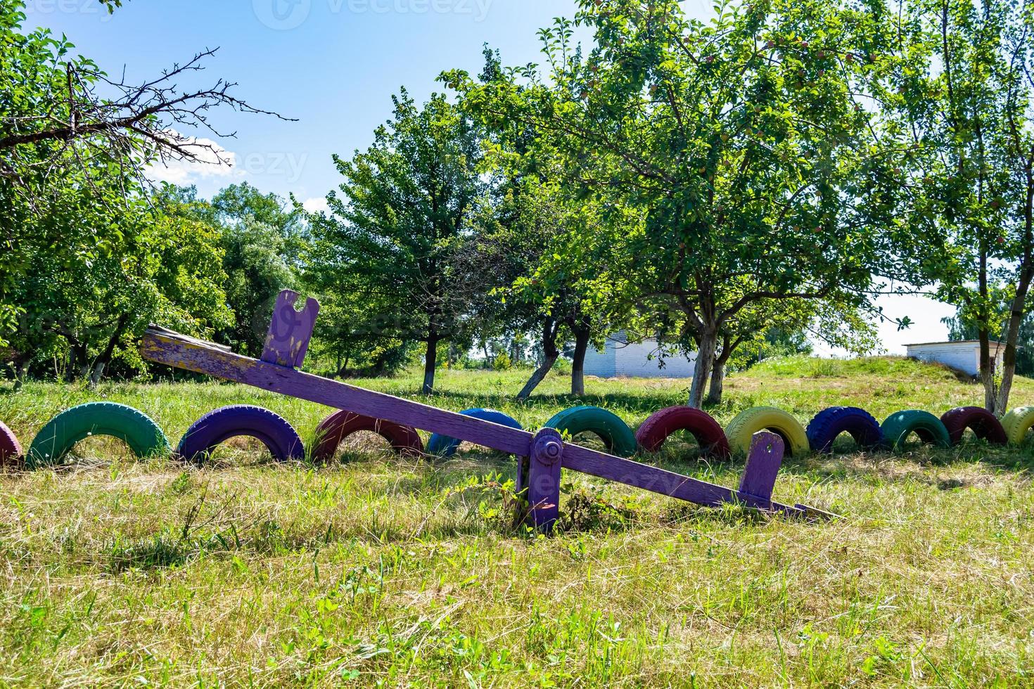 Photography on theme empty playground with metal swing for kids photo