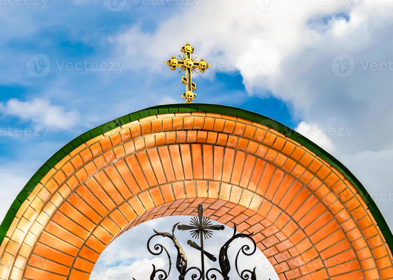 Christian church cross in high steeple tower for prayer photo
