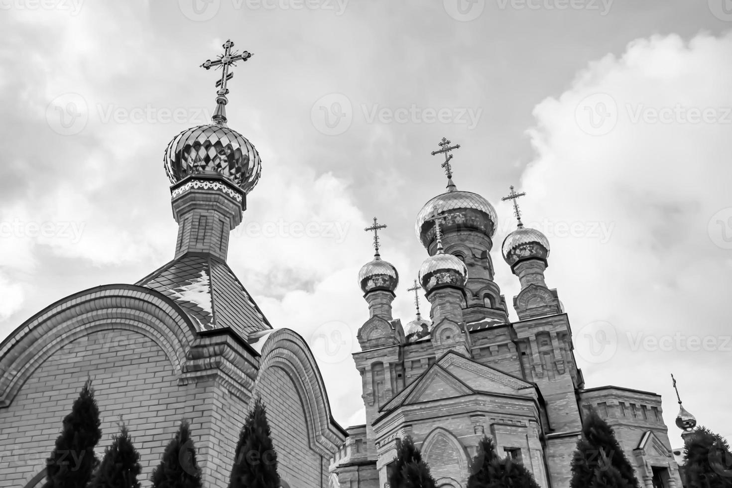 Christian church cross in high steeple tower for prayer photo