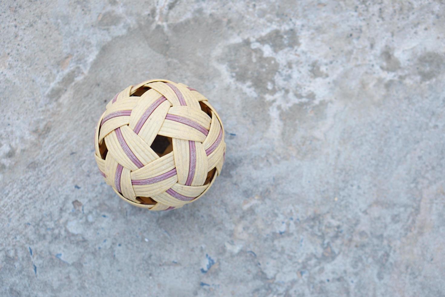 Sepak takraw ball on the ground photo