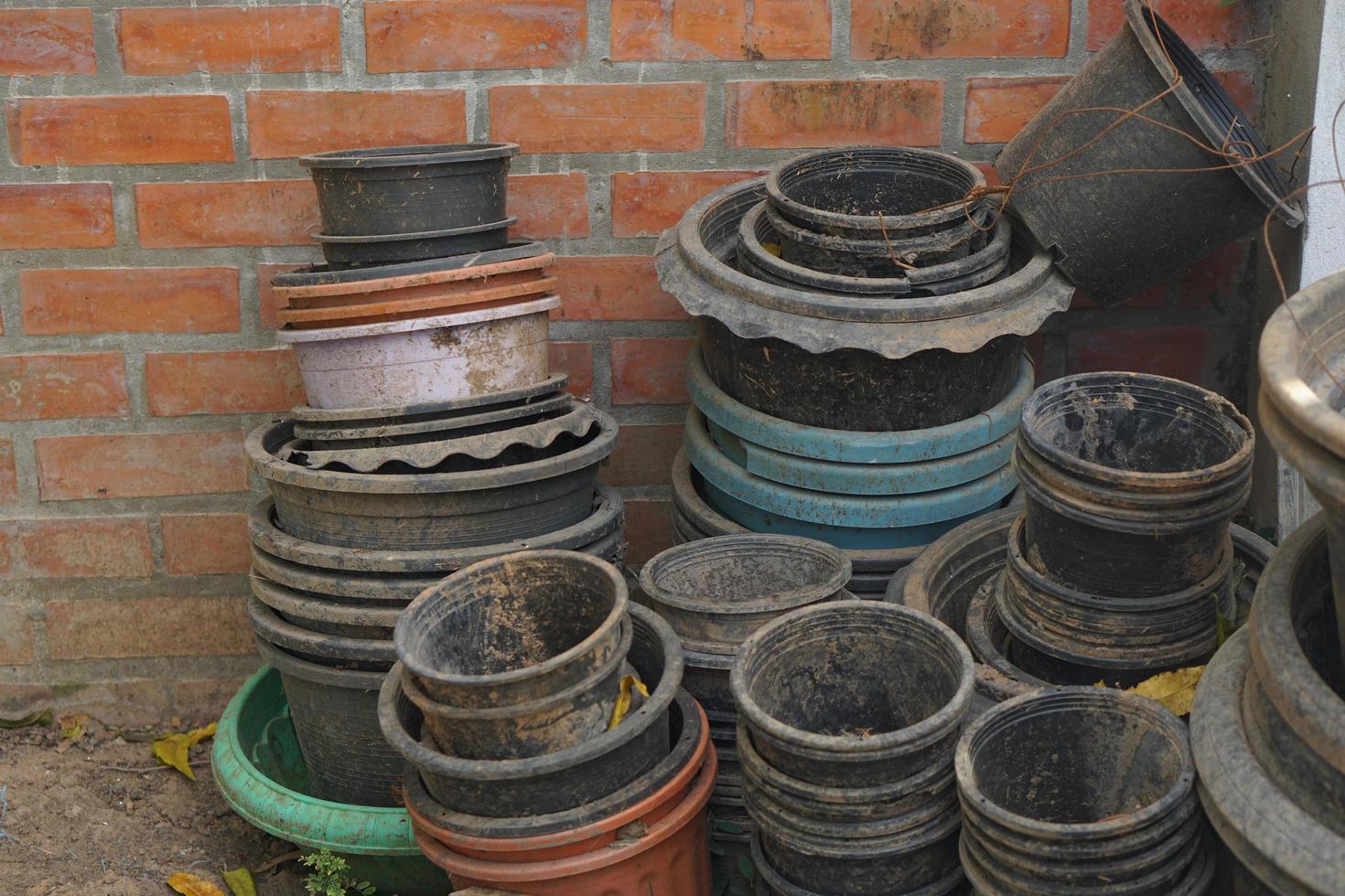 Old plant pots stacked against each other on the wall. 16658350 Stock