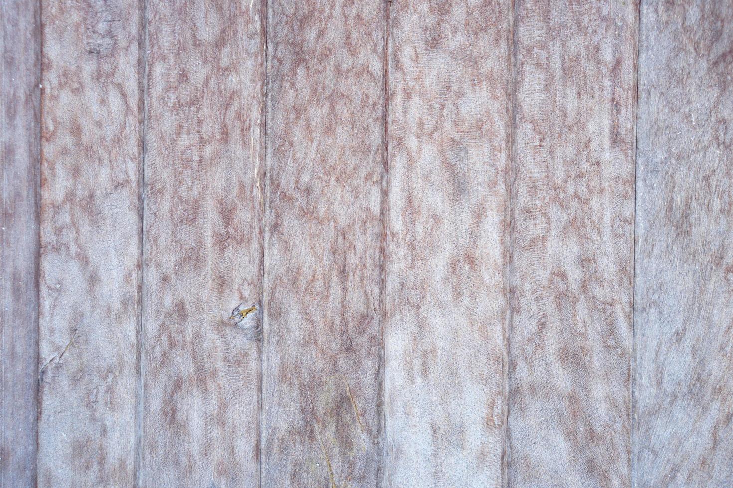 Patterned old decayed wood background photo