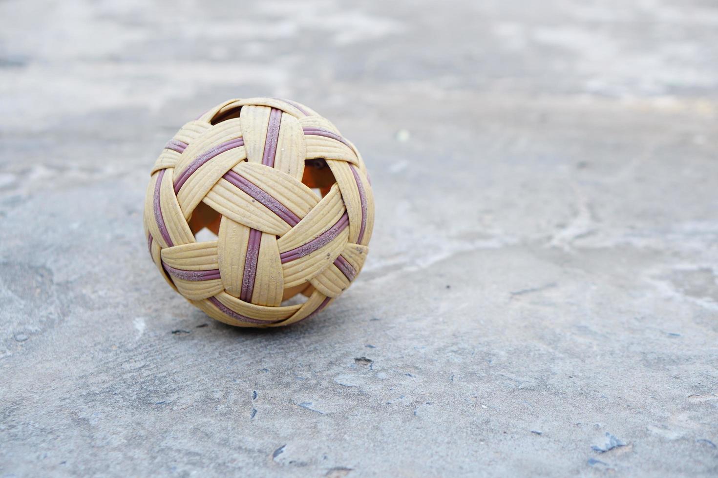 Sepak takraw ball on the ground photo