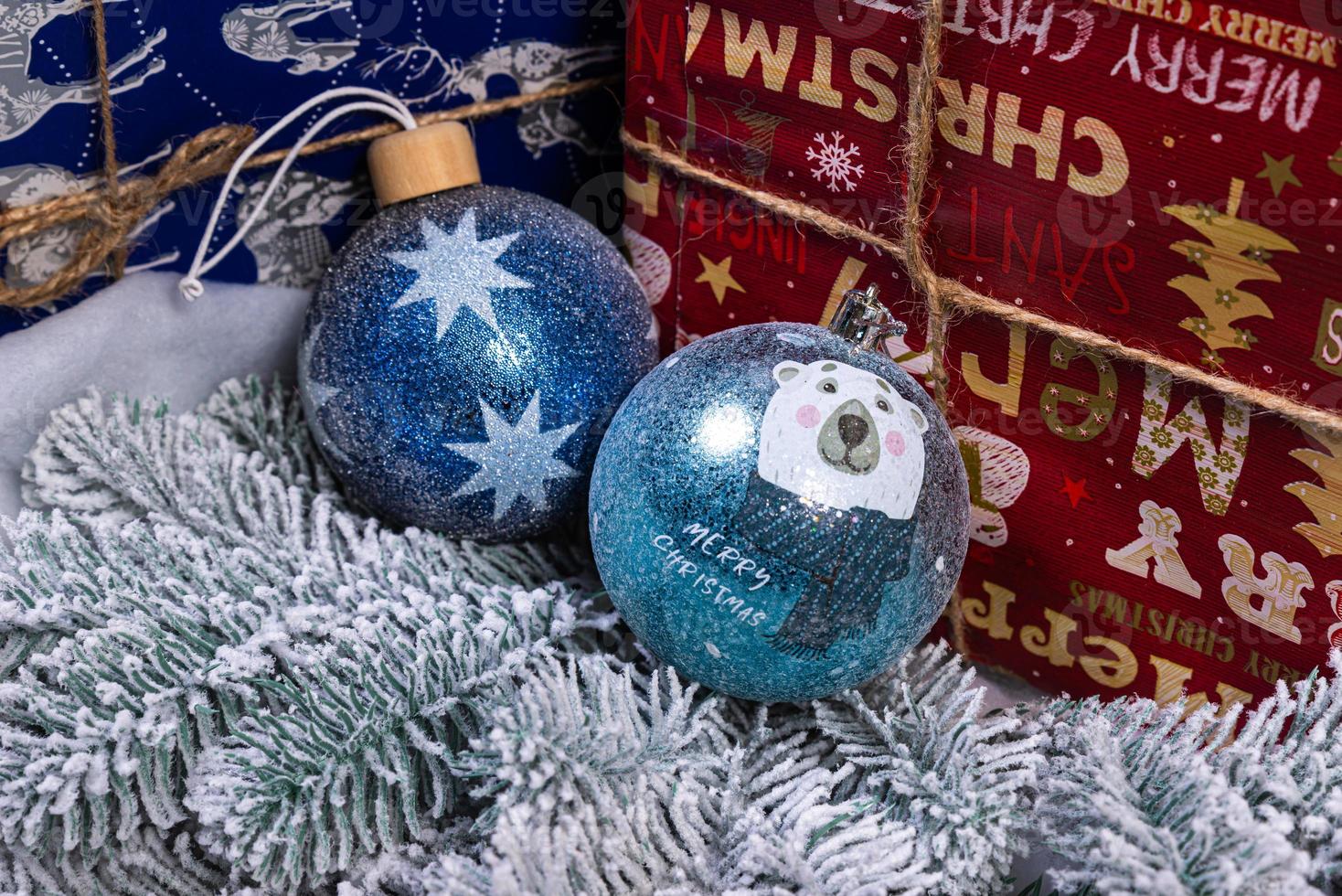 Creative diy craft hobby. Making handmade craft christmas ornaments and balls with felt spruce tree. christmas tree with colorful balls and gift boxes over white brick wall with blue and white balls photo