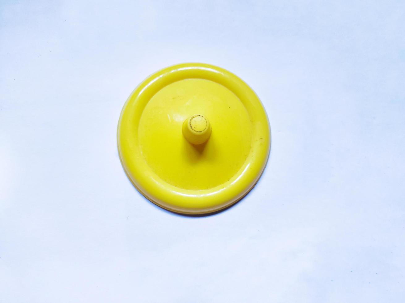 isolated yellow cup lid photo in studio with white background