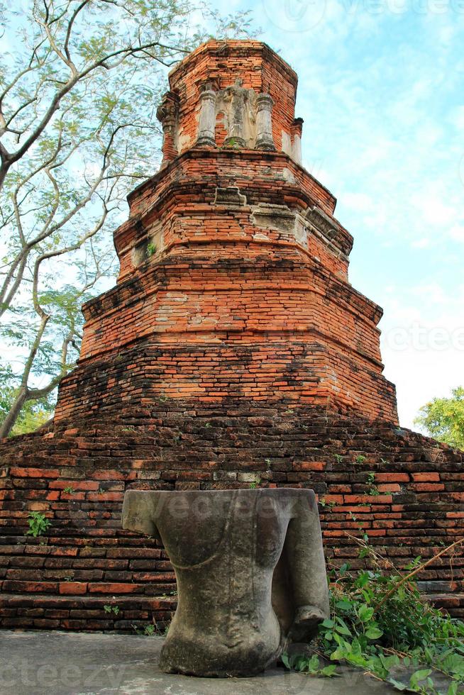 The ruins of ancient city with statue of Buddha. Ayutthaya Historical park. Ayutthaya, Thailand. photo