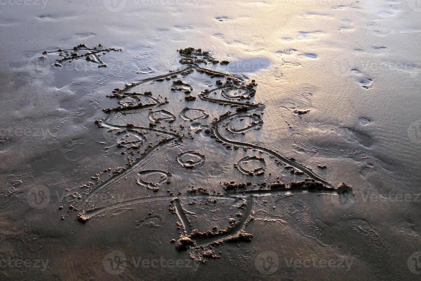 Christmas tree on the sand beach on sunset. Island Koh Chang, Thailand. photo