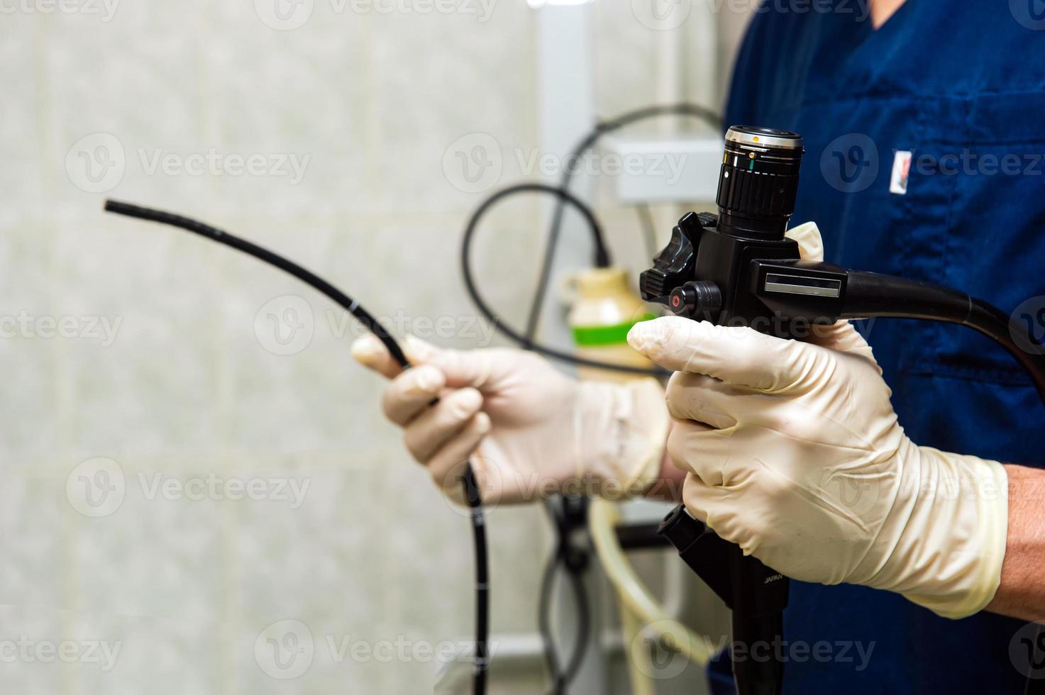 Endoscope in the hands of doctor. Medical instruments used in gastroscopy.Gastric probe photo