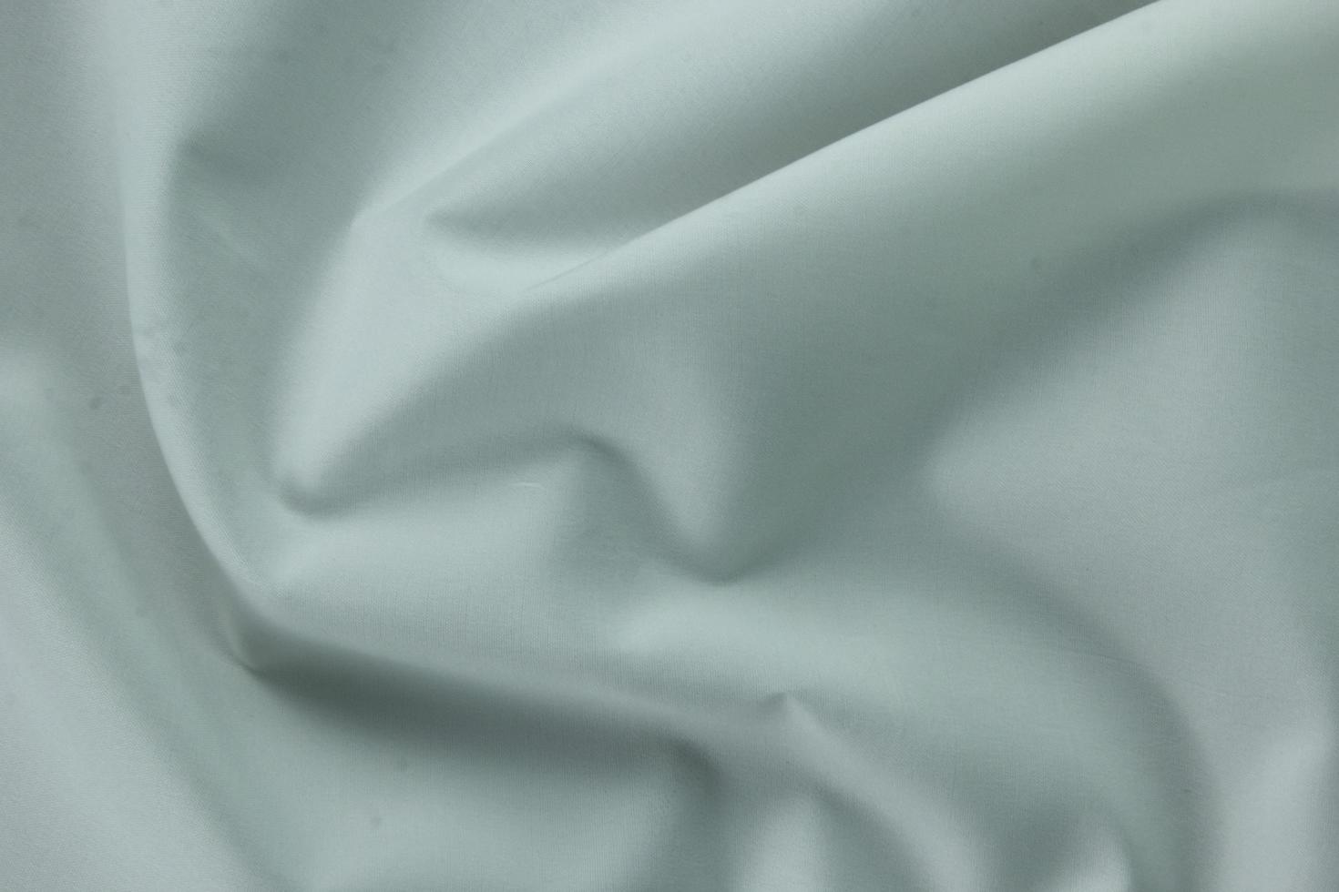 13 textura suave de algodón blanco, fondo de seda curva, patrón. textura de tela de seda blanca. hermosa seda suave esmeralda. foto