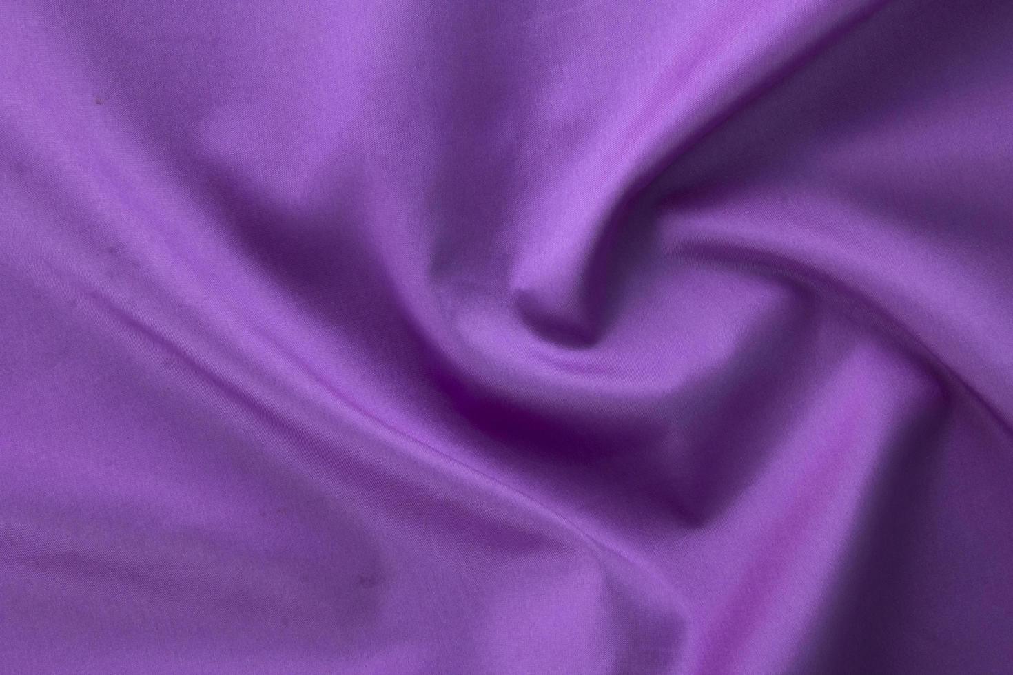 5 smooth purple cotton Texture, curved silk background, pattern. Texture of purple silk fabric. Beautiful emerald soft silk. photo