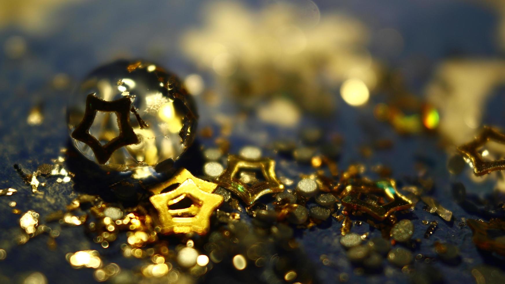 Close-up Of water drop with glitter on it in different colorful loghts in Karachi Pakistan 2022 photo