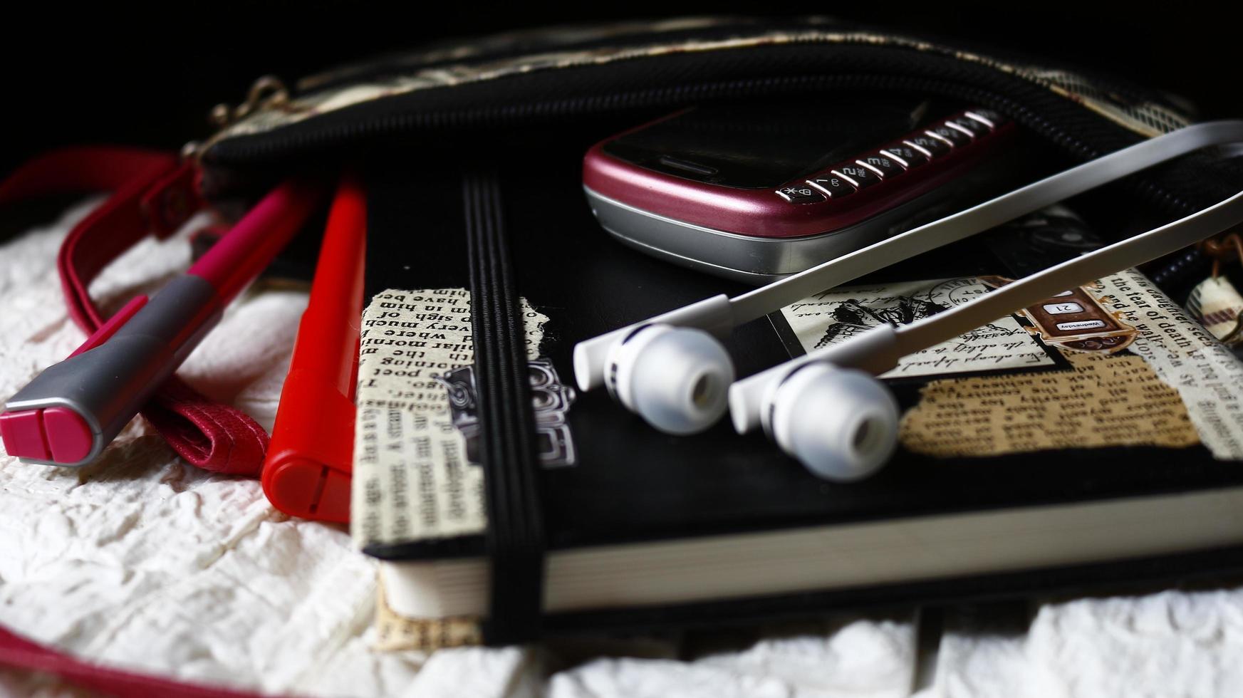 Work Bag And Office Diary On Table in Karachi Pakistan 2022 photo