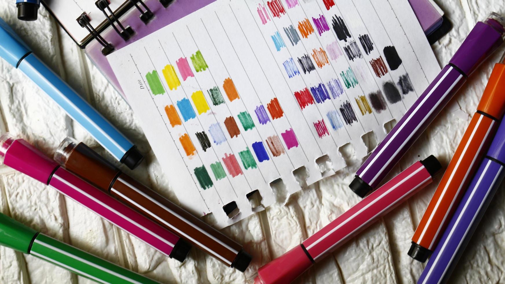 Various Colored Art Supplies Scattered On Table In Karachi Pakistan 2022 photo