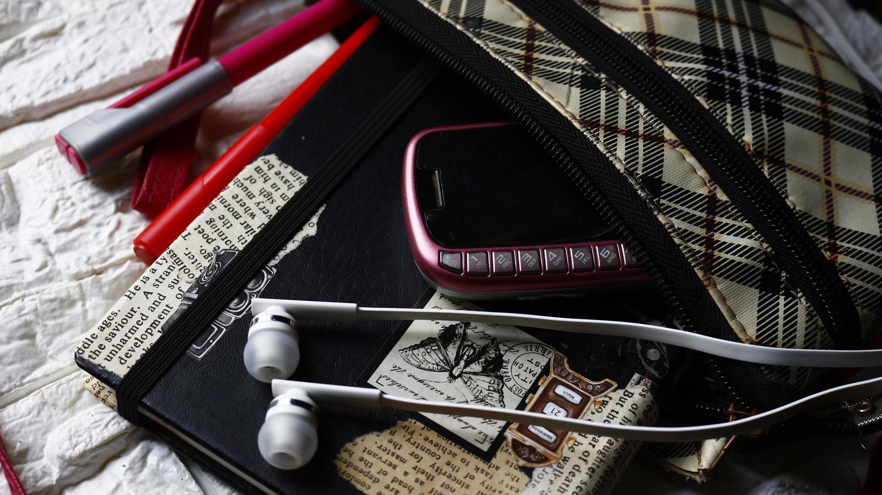 Work Bag And Office Diary On Table in Karachi Pakistan 2022 photo
