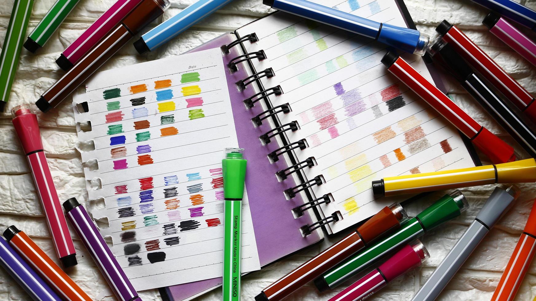 Various Colored Art Supplies Scattered On Table In Karachi Pakistan 2022 photo