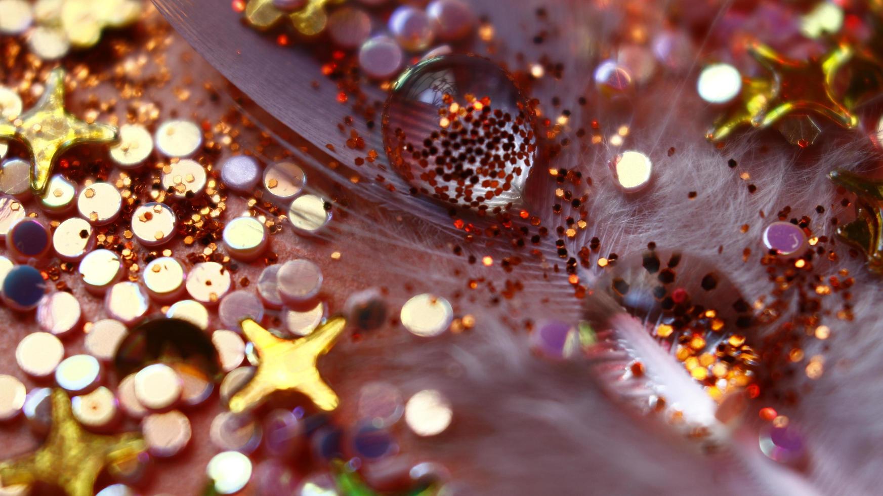Close-up Of water drop with glitter on it in different colorful loghts in Karachi Pakistan 2022 photo