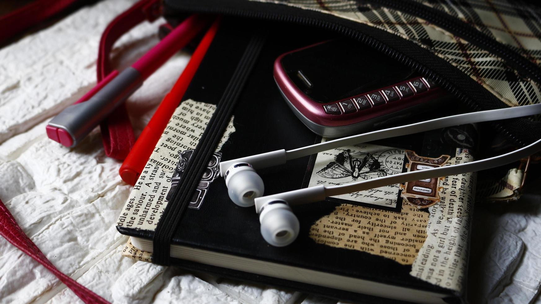 Work Bag And Office Diary On Table in Karachi Pakistan 2022 photo