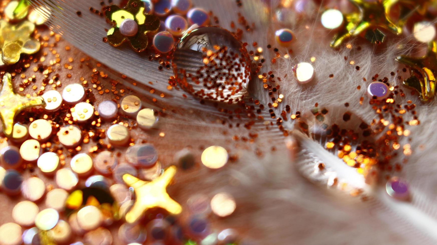 Close-up Of water drop with glitter on it in different colorful loghts in Karachi Pakistan 2022 photo