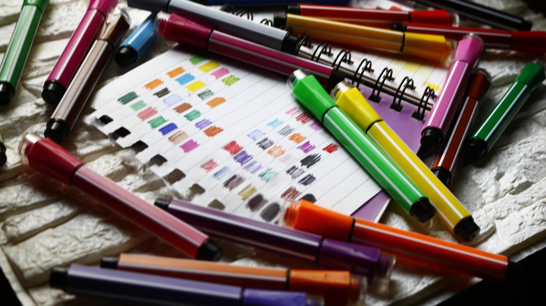 Various Colored Art Supplies Scattered On Table In Karachi Pakistan 2022 photo