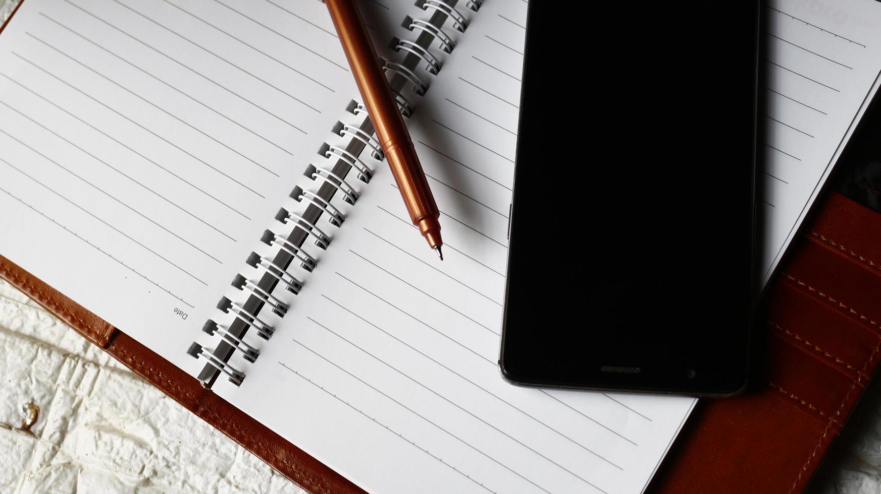 Work Bag And Office Diary On Table in Karachi Pakistan 2022 photo