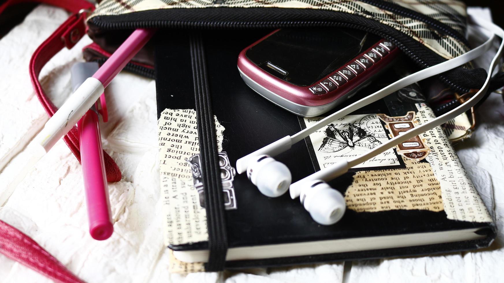 Work Bag And Office Diary On Table in Karachi Pakistan 2022 photo