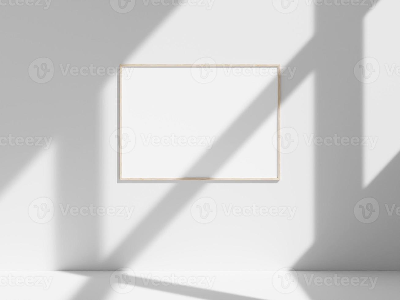 Empty frame on the white wall with window shadow photo