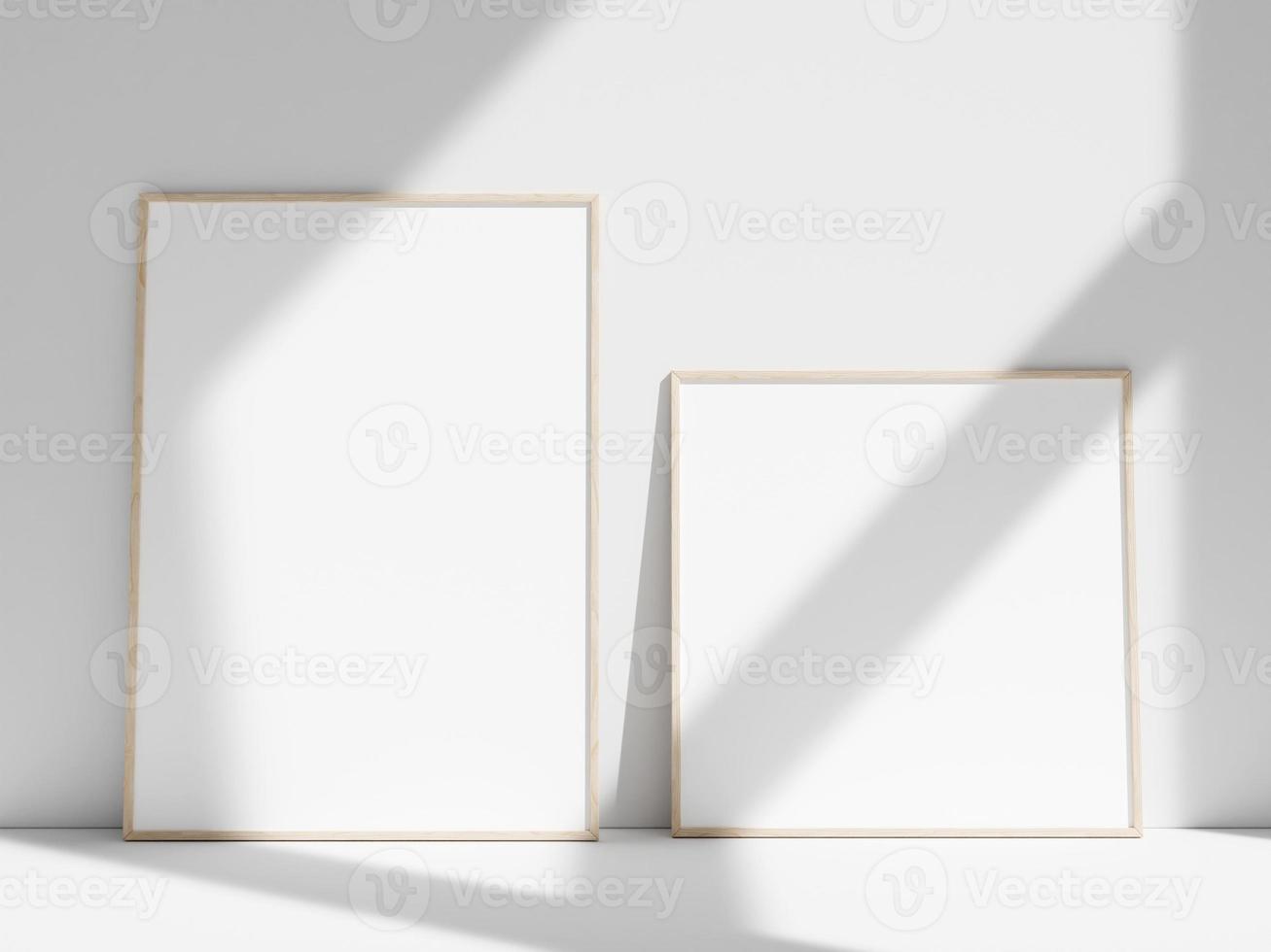 Empty frame on the white wall with window shadow photo