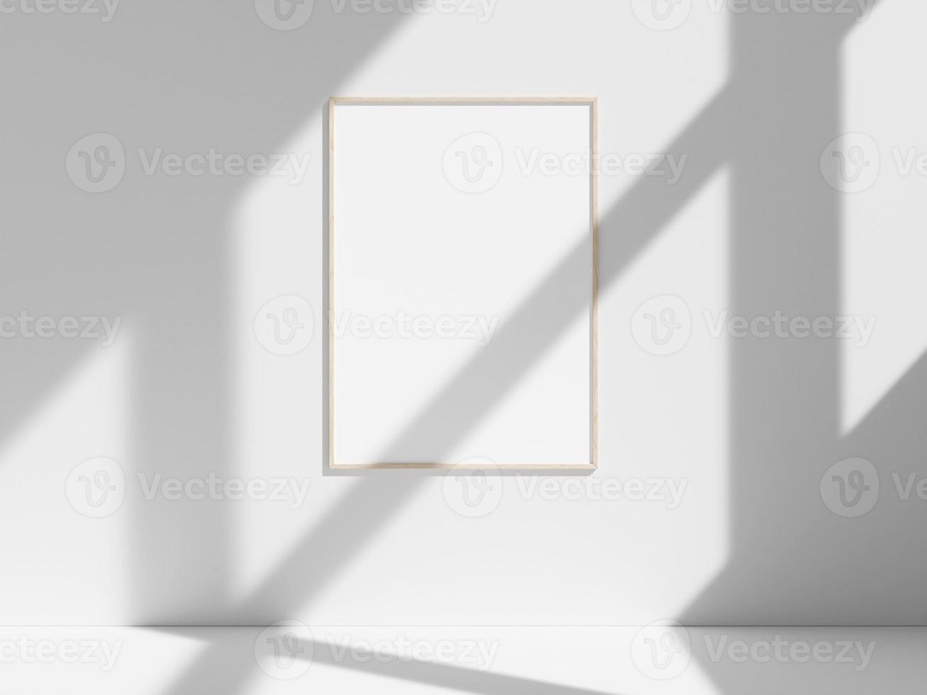 Empty frame on the white wall with window shadow photo