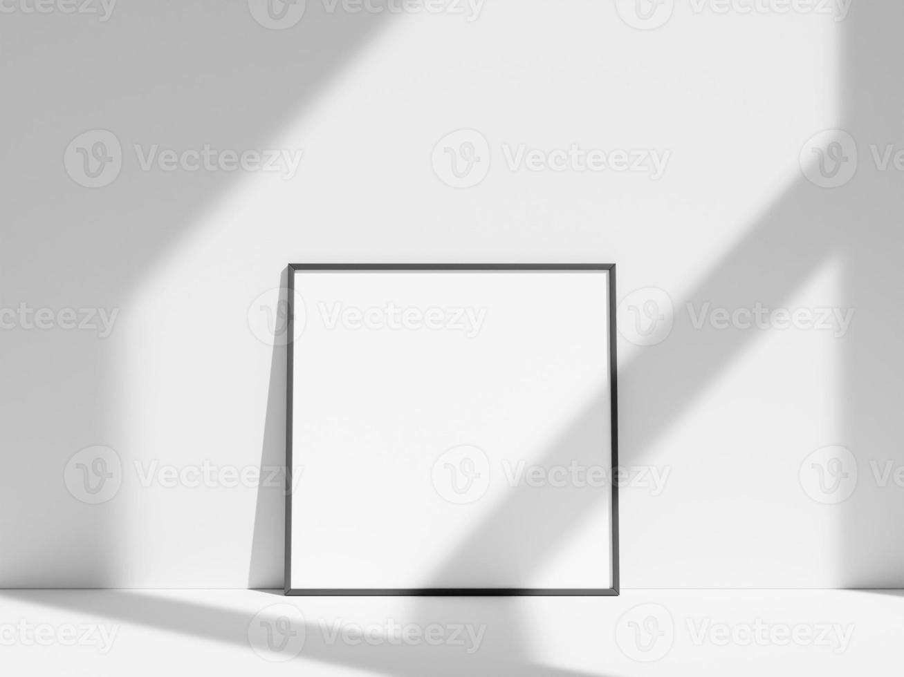 Empty frame on the white wall with window shadow photo