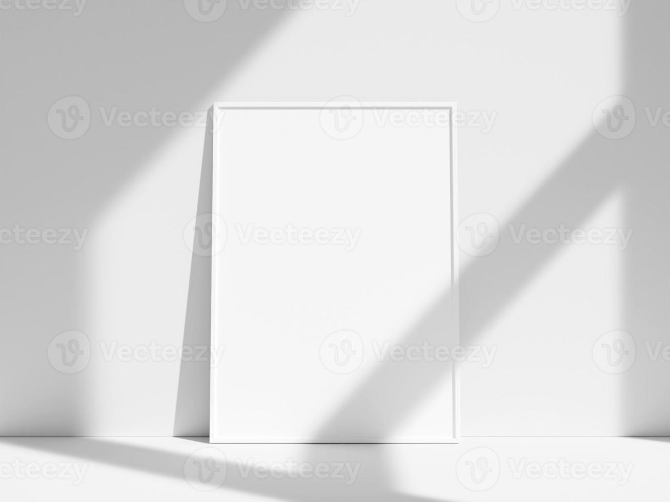 Empty frame on the white wall with window shadow photo
