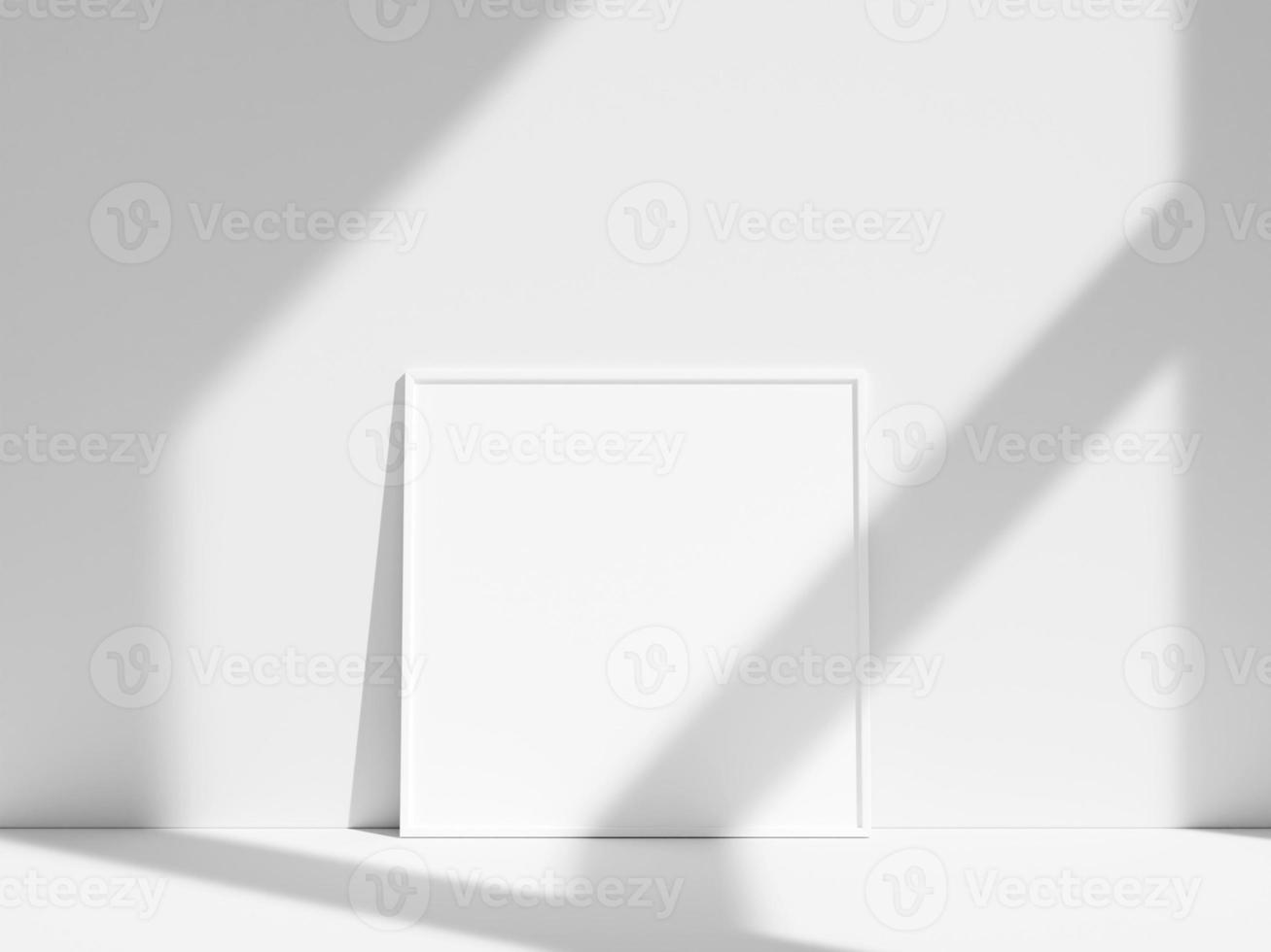 Empty frame on the white wall with window shadow photo
