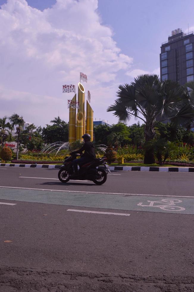 Surabaya, Indonesia, 2022 - monumen bambu runcing. The pointed bamboo monument building is located at the intersection of the Surabaya city highway. photo